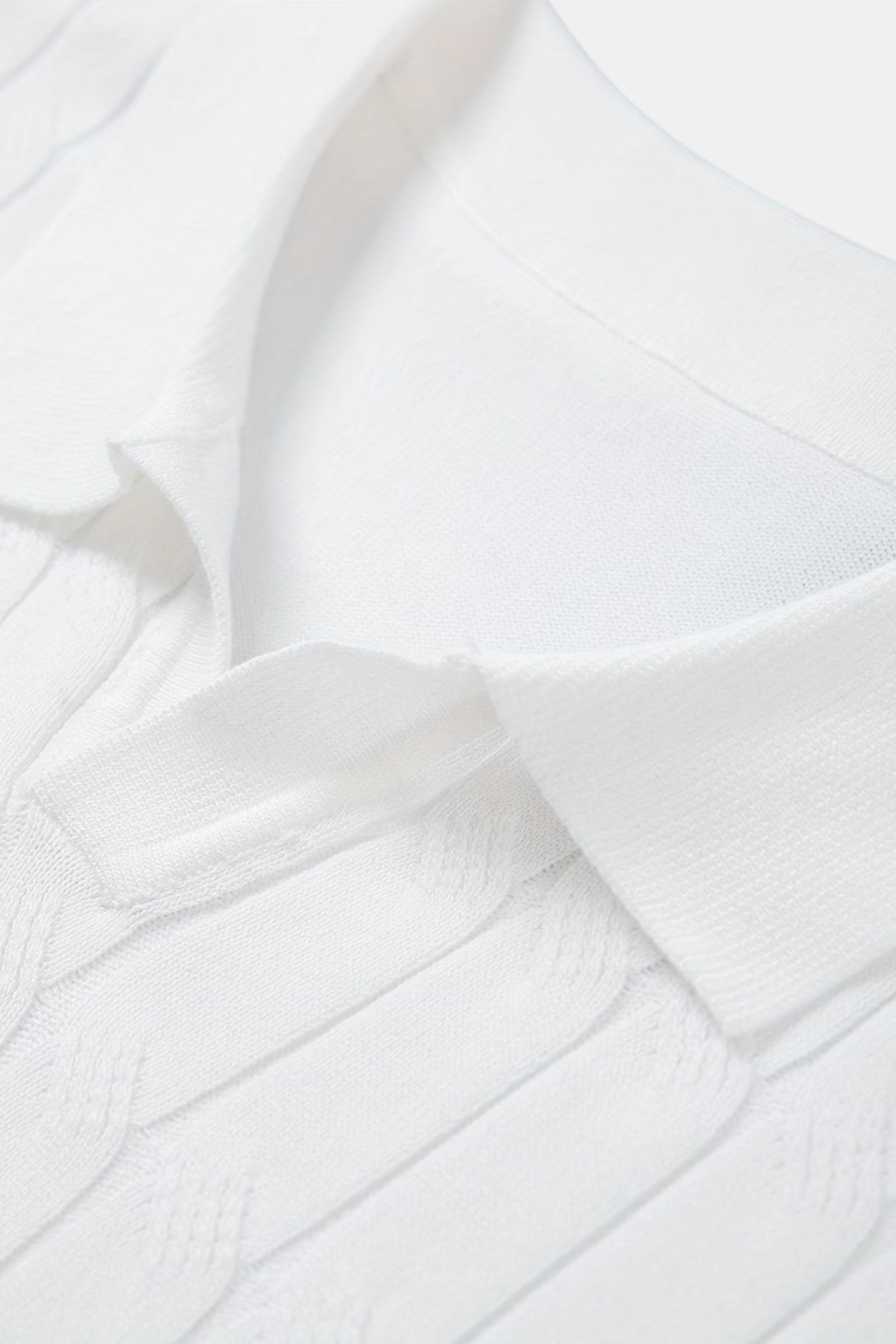 Polo de punto trenzado con cuello en V Premium de NOBA