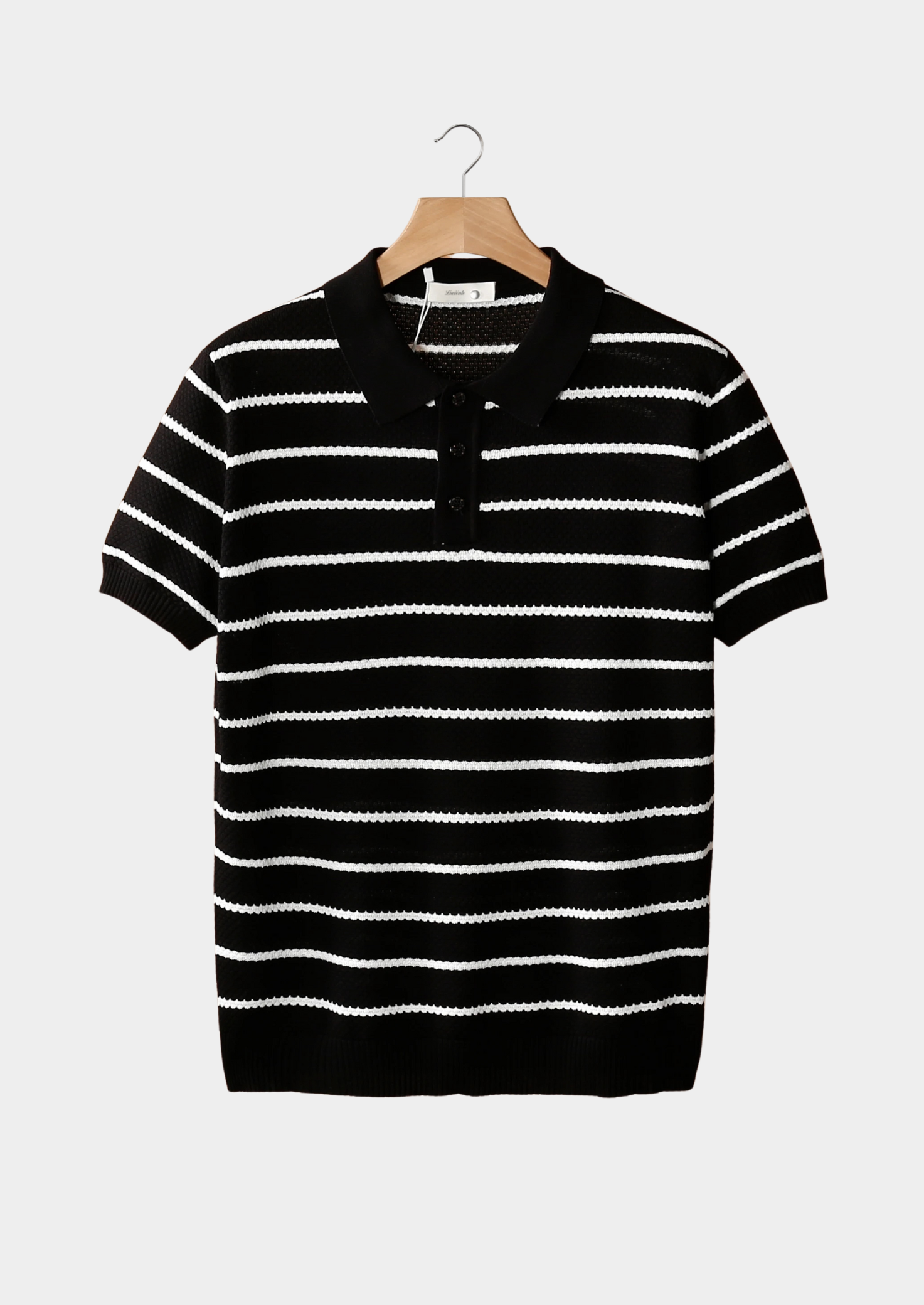 POLO DE BOTONES CON TEXTURA DE RAYAS