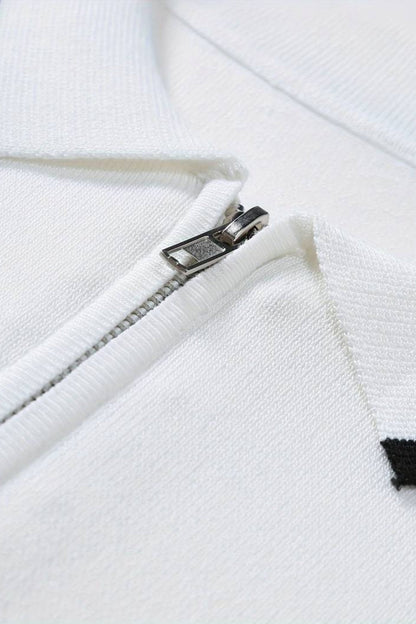 Polo de golf de punto con cremallera de un cuarto de NOBA