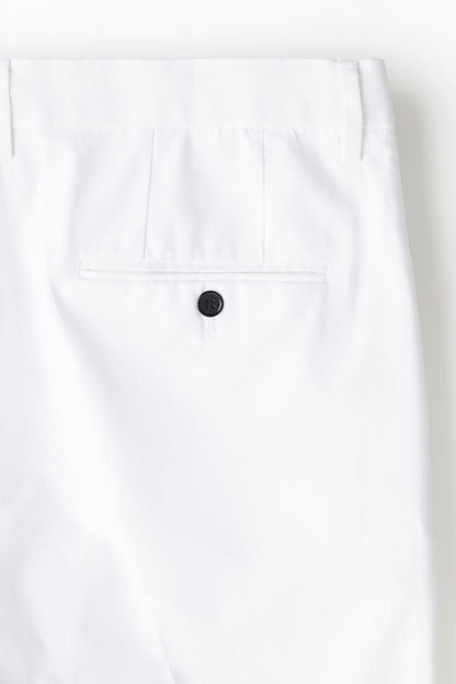 Pantalones chinos elegantes y espaciales ajustados 