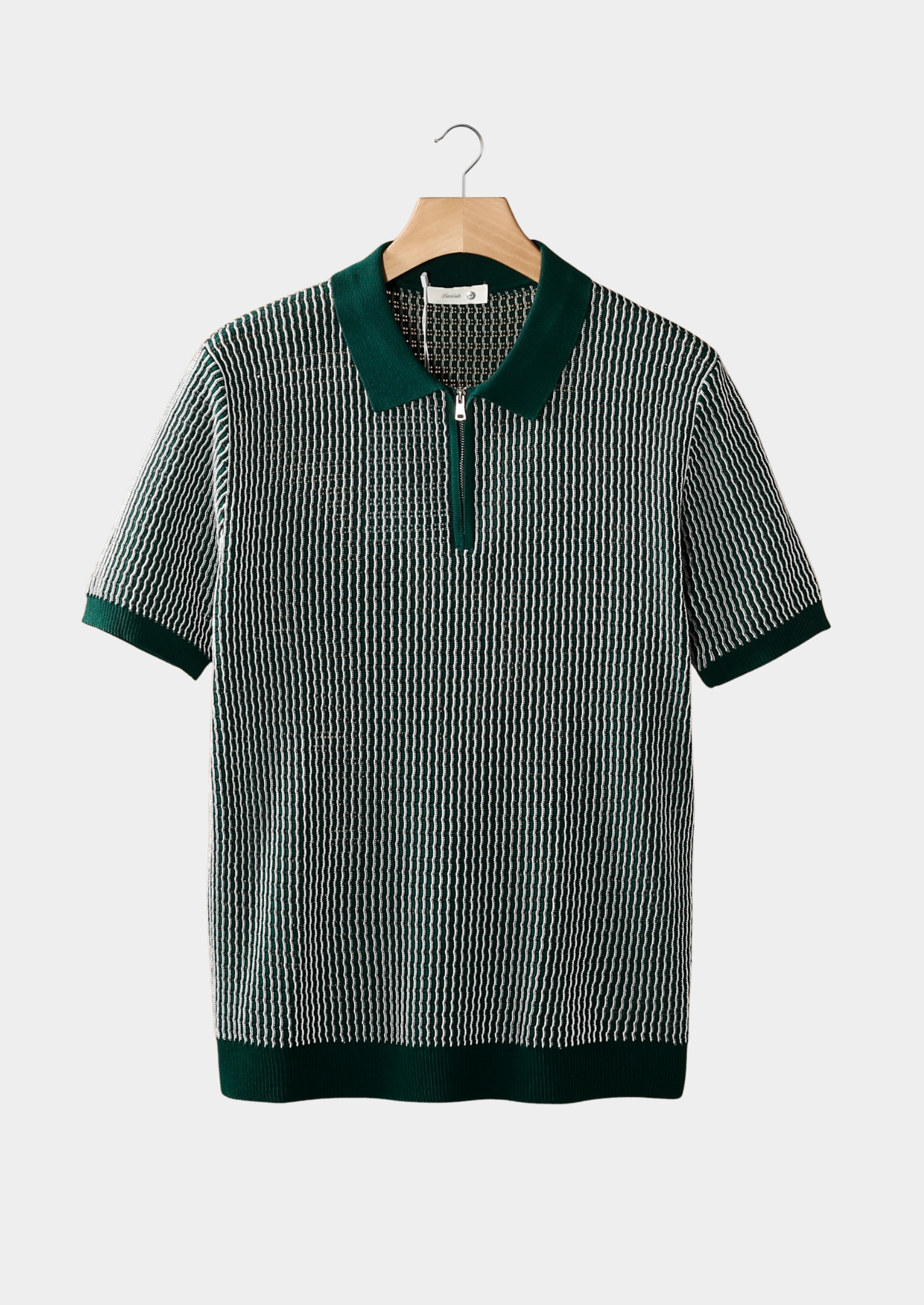 POLO CON CREMALLERA Y TEXTURA GEOMÉTRICA