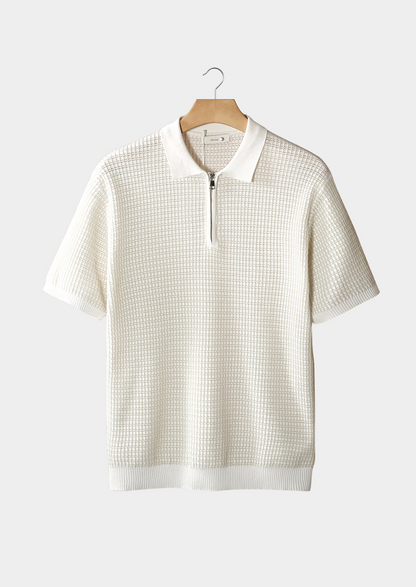 POLO CON CREMALLERA Y TEXTURA GEOMÉTRICA