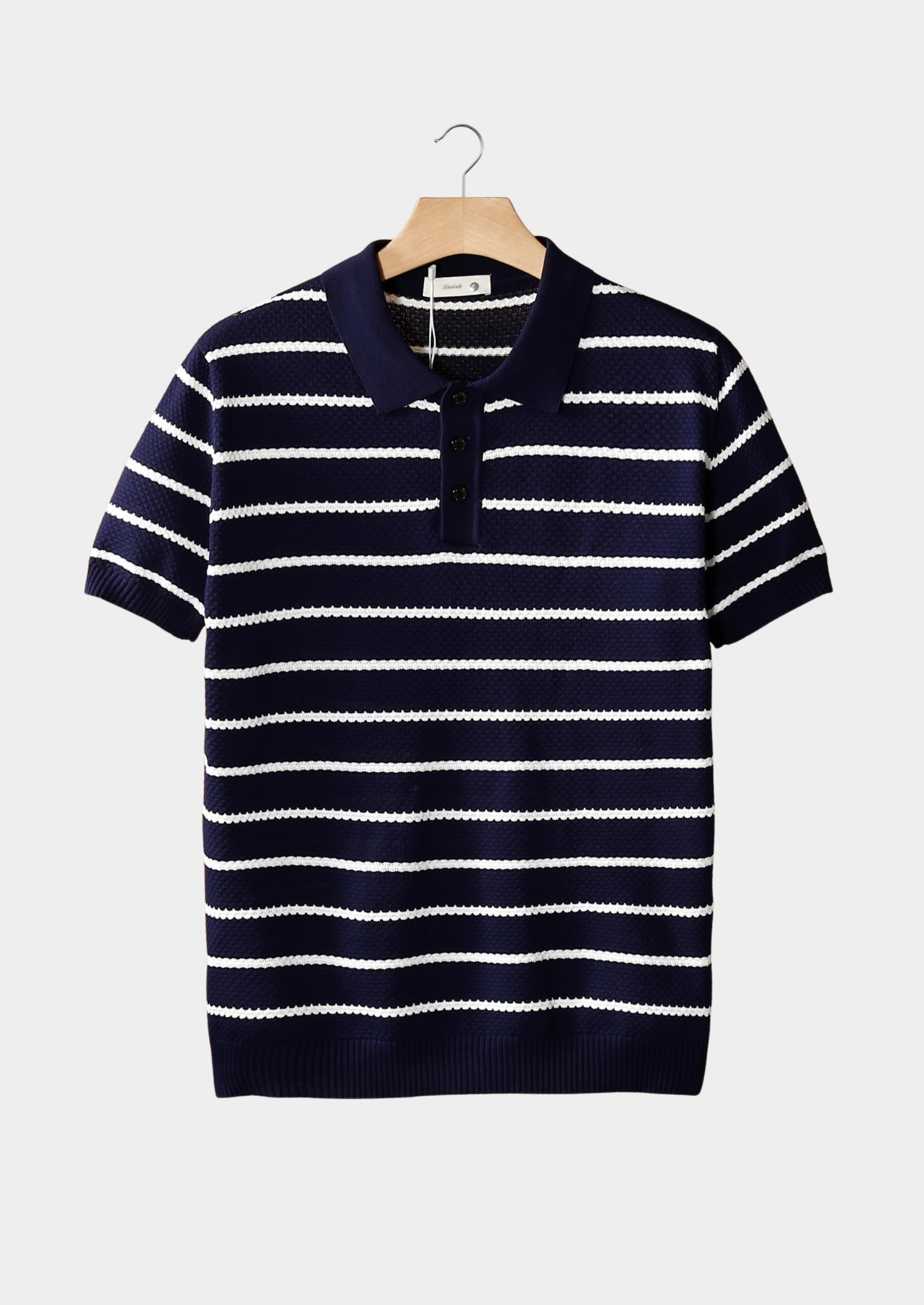 POLO DE BOTONES CON TEXTURA DE RAYAS